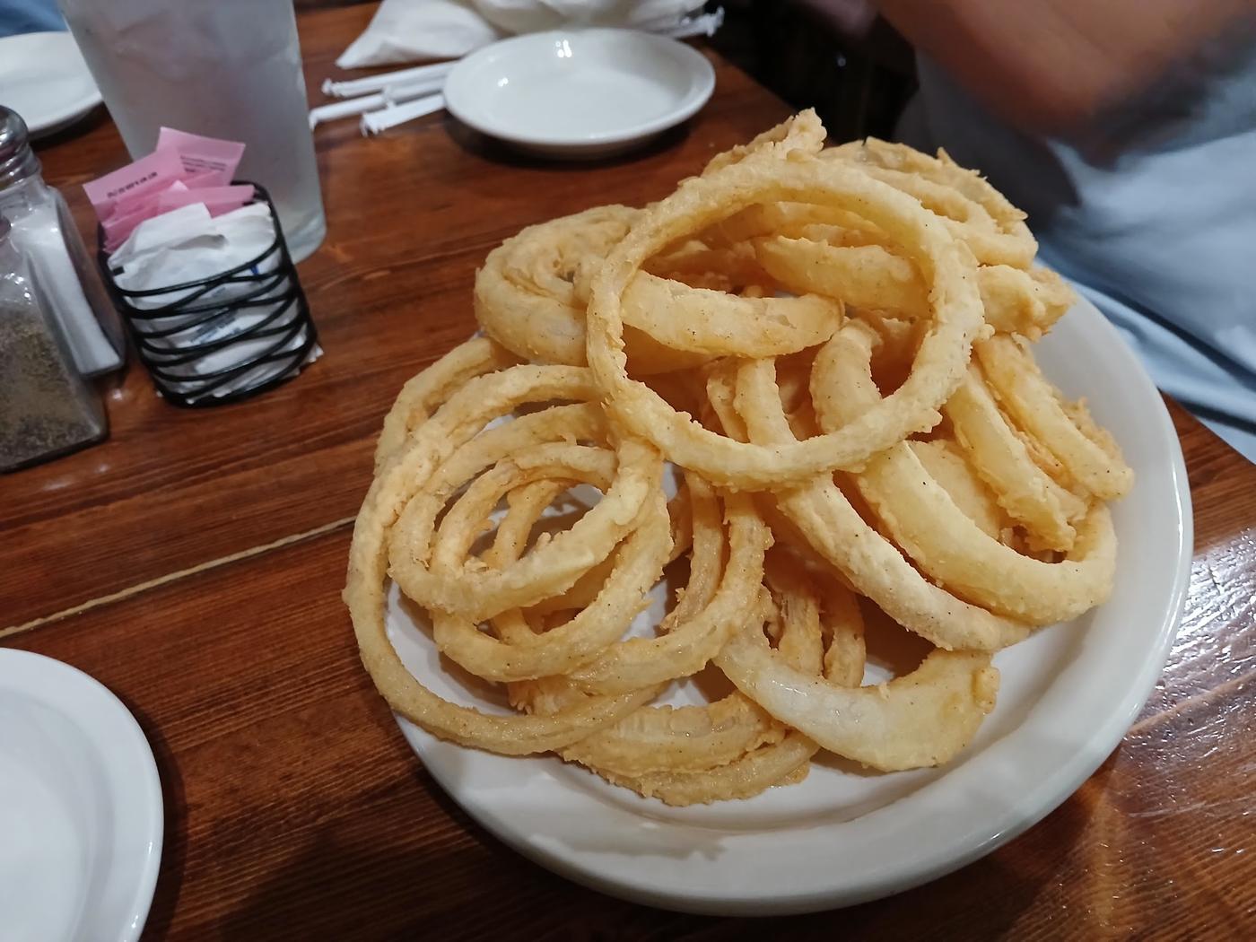 A full plate of hand cut onion rings at the Anvil Saloon